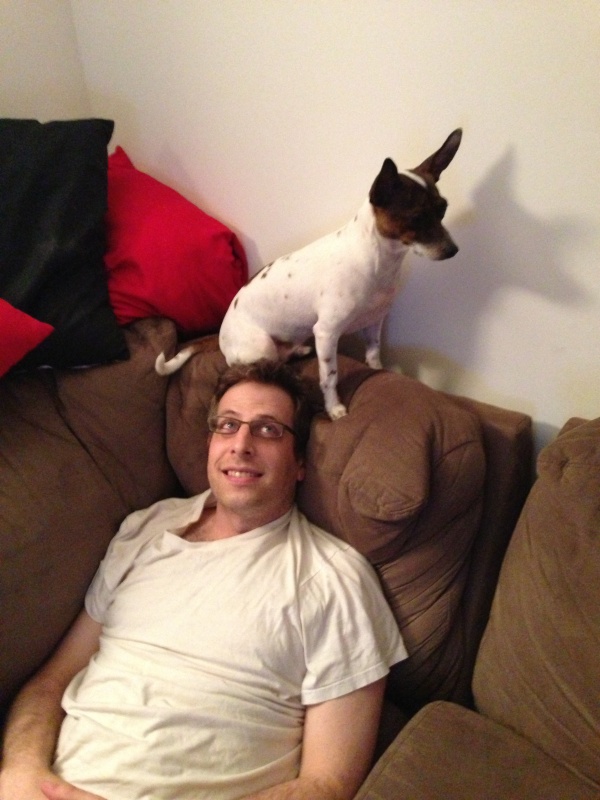 larry the pup on andy's head